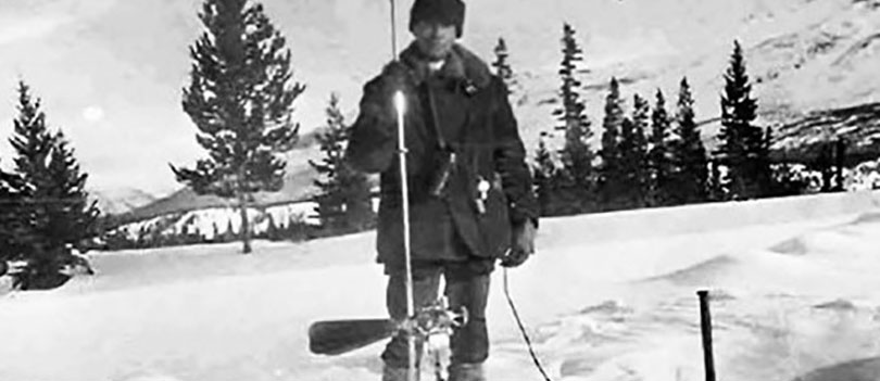 Black and White photo of Scientist Collecting Data.