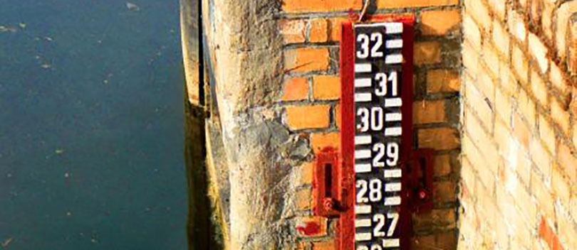 Red staff gauge.
