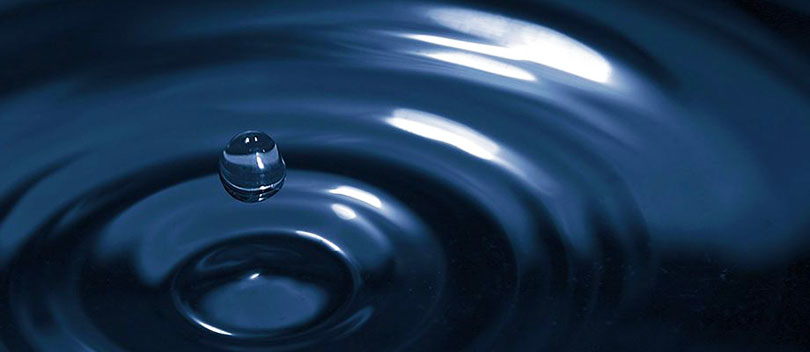 Ripples in water from a water drop.