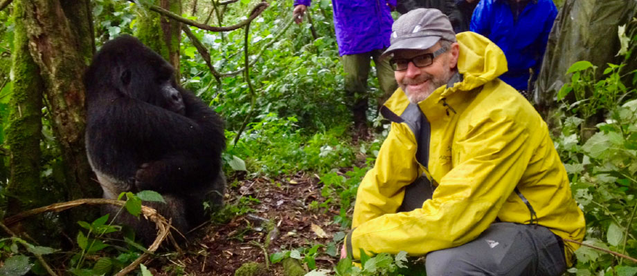 Stu Hamilton (Author, Hydrology Corner Blog) posing with Agasha, a silverback mountain gorilla, in Rwanda.