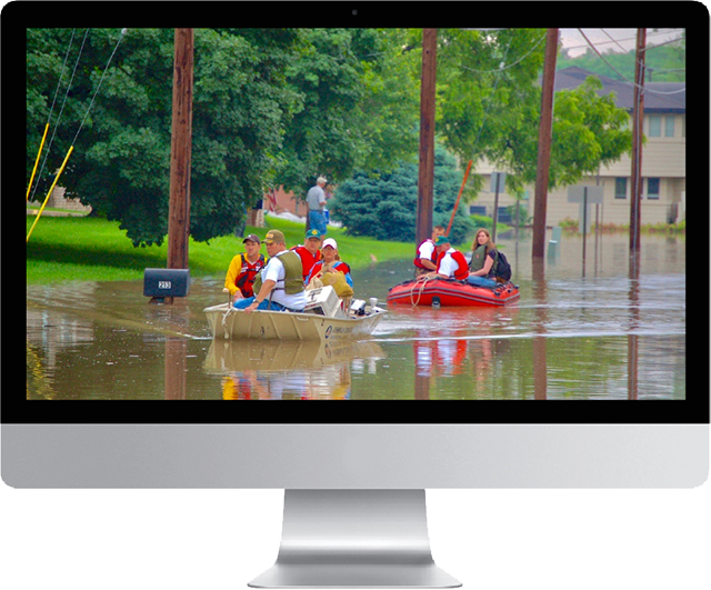 People rafting in a flood zone on a mac desktop computer.