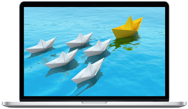 Paper boats floating on water on a macbook screen.