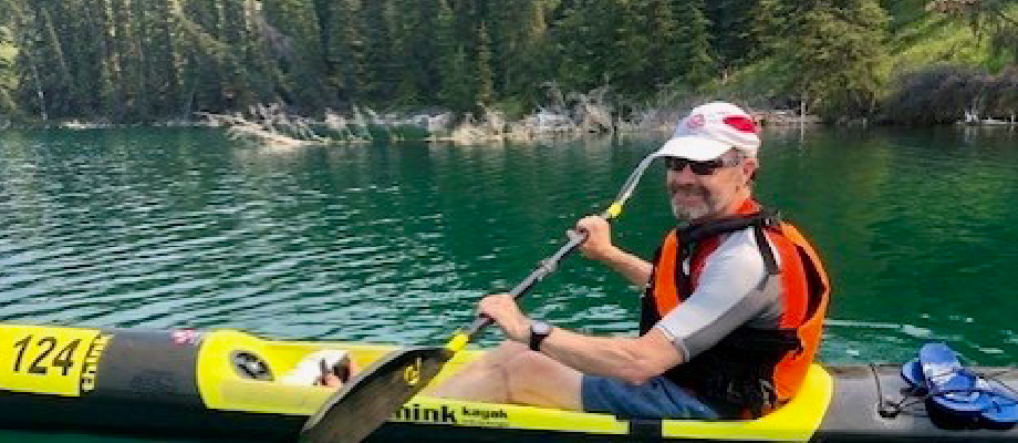 Stu Hamilton in a kayak on a Yukon river.